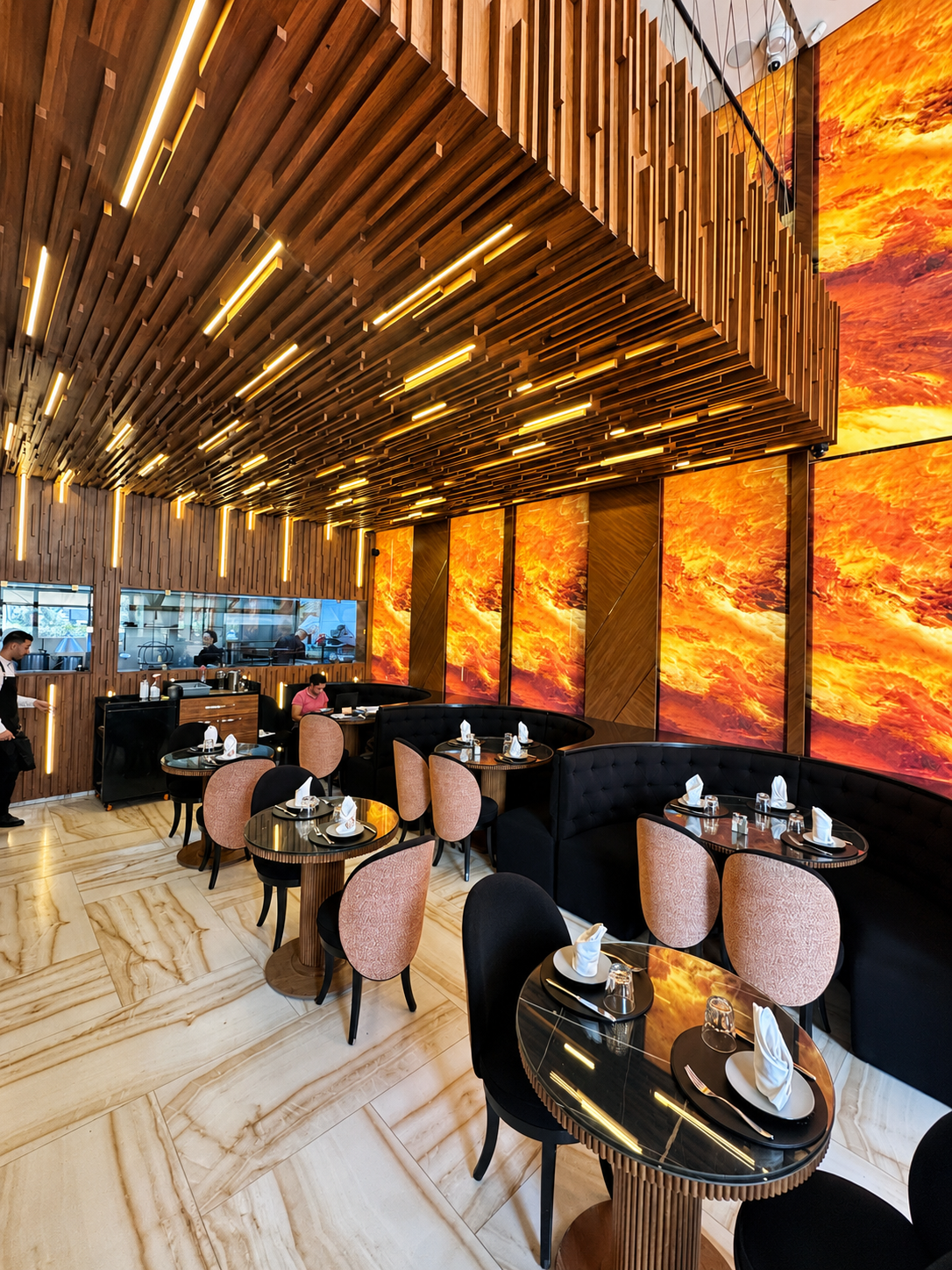 Grand Dining Room with Illuminated Fire Onyx Walls